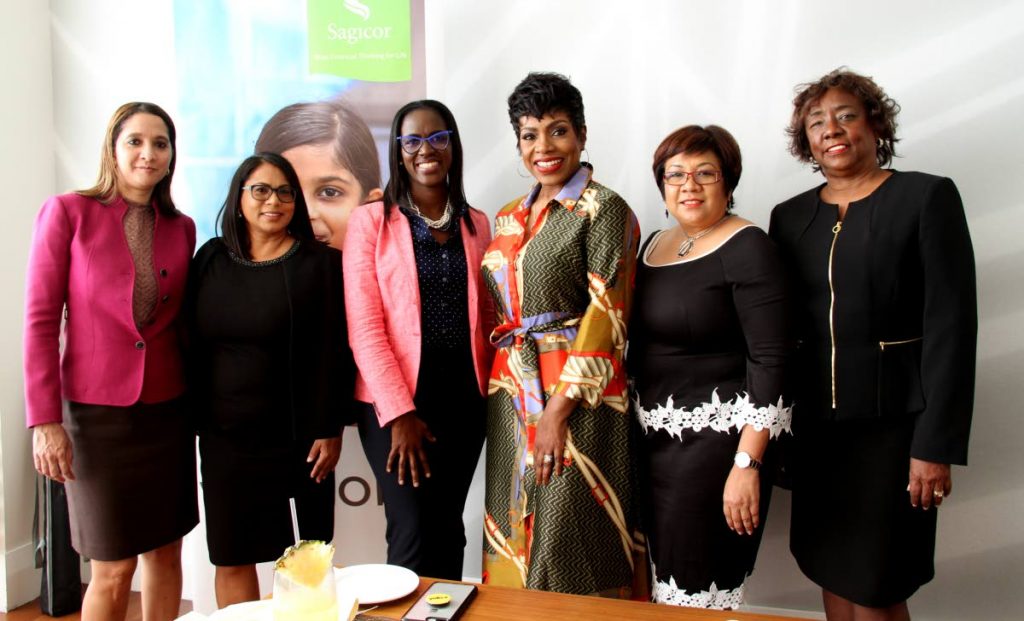 American actress Sheryl Lee Ralph Hughes, third from right, with Sagicor staff at the Hyatt Regency Trinidad.PHOTOS BY CHOLAI