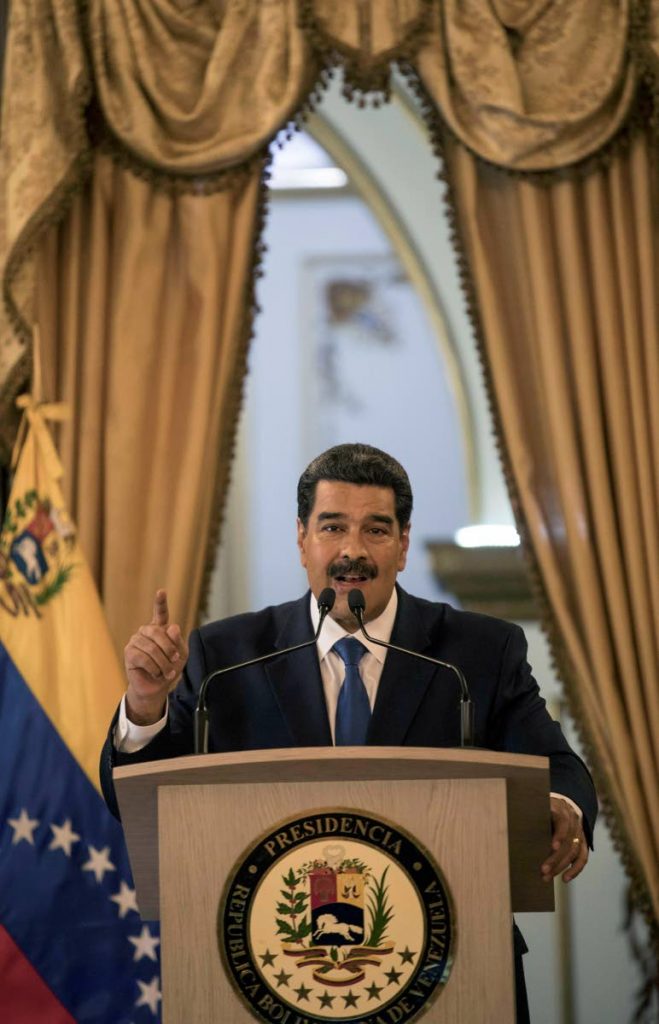 Venezuela's President Nicolas Maduro talks during a press conference at Miraflore's Presidential Palace in Caracas, Venezuela, on Friday. AP PHOTO
