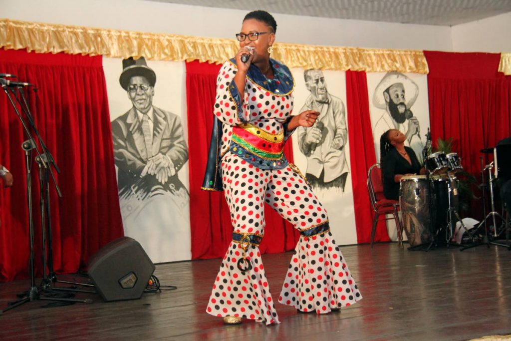 Victoria Cooper Rahim, also known as Queen Victoria, gives the audience a taste of her lyrical skills at Kaiso Showkase Palm's Club, San Fernando on Friday night. PHOTO BY CHEQUANA WHEELER