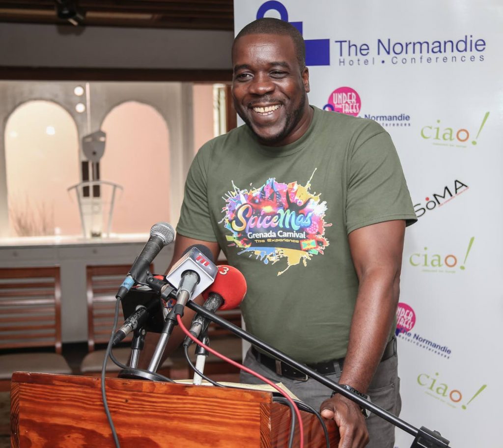 Grenada’s Minister of Youth, Sports, Culture and the Arts, Norland Cox addresses a media conference at The Normandie, St Ann's yesterday. PHOTO BY JEFF MAYERS