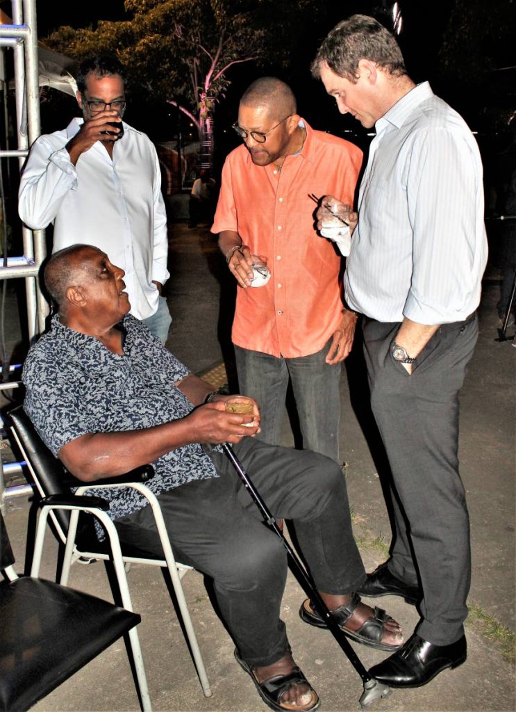 Carlos John and Proman CEO David Cassidy with Ken Julien (seated).