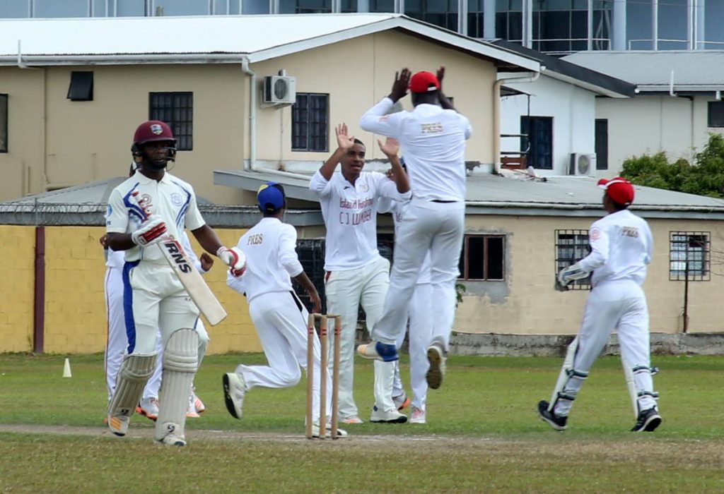 Presentation College players celebrate the dismissal of Naparima’s Cephas Cooper, left, in a Powergen Secondary Schools Cricket League match at Presentation College Ground, Chaguanas, yesterday.