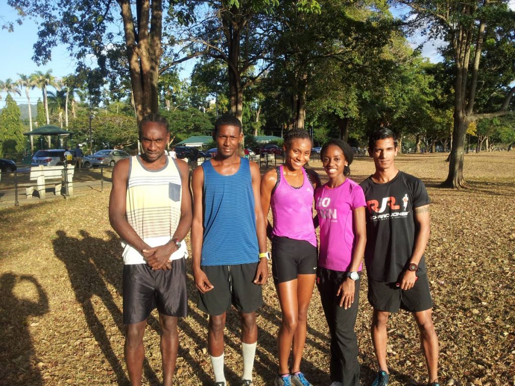 TT cross country athletes Sherwin Stapleton, from left, Anthony Phillip, Samantha Shukla, Tonya Nero and Shirvan Baboolal at a training session at the Queen's Park Savannah, yesterday.