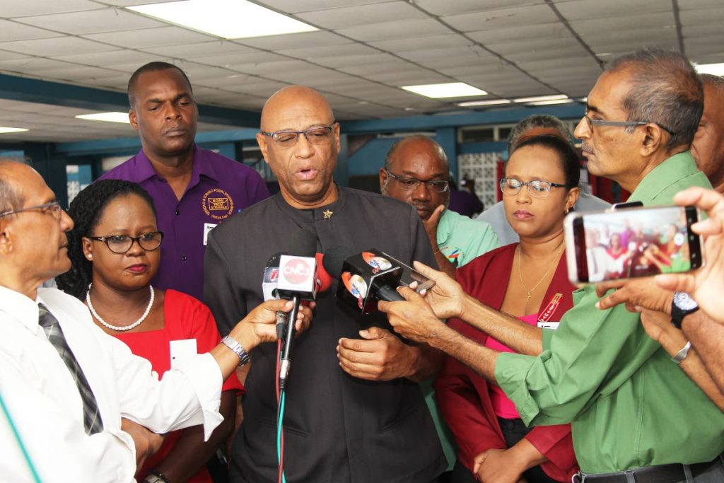 Joint Trade Union Movement president Ancel Roget, addresses the media ahead of the group’s biennial conference at Paramount Building, San Fernando.