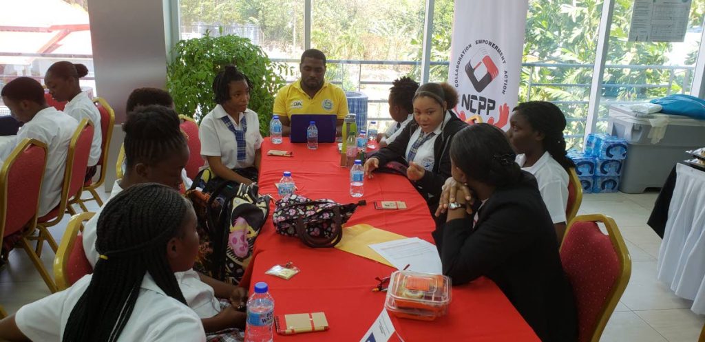 Students and teachers engage in discussions at Tuesday’s NCPP Youth Outreach Engagement at the Conference Room of the Division of Community Development at Glen Road, Scarborough.