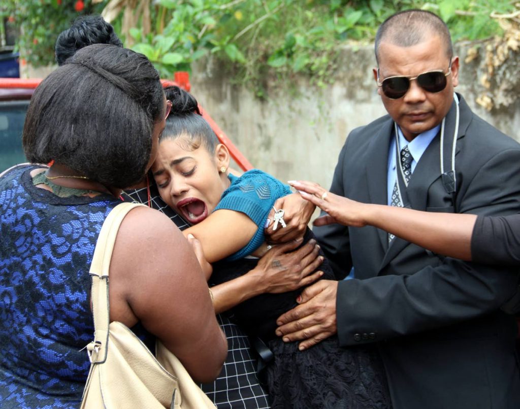 A MOTHER’S PAIN: Maria Granger screams her sorrow yesterday at 
the funeral for her three-year-old son Prince who was burnt to death 
last Friday.