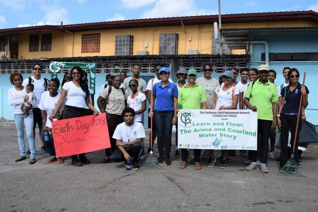 Curmira Gulston, far right, at work on the project Learn and Flow: The Arima and Courland
Water Story. 

Photo courtesy Caribbean Youth Environmental Network TT Chapter.