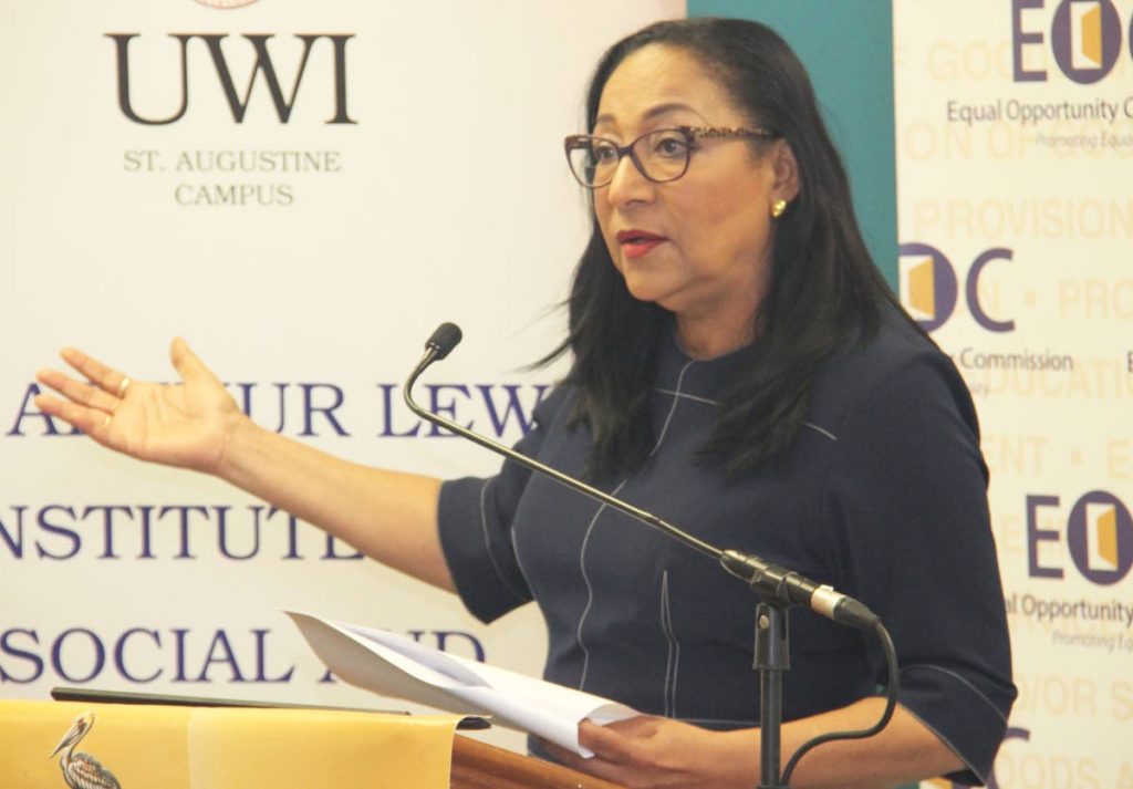 EOC chairman Lynette Seebaran Suite makes a point at the panel discussion at the Institute of International Relations, UWI.