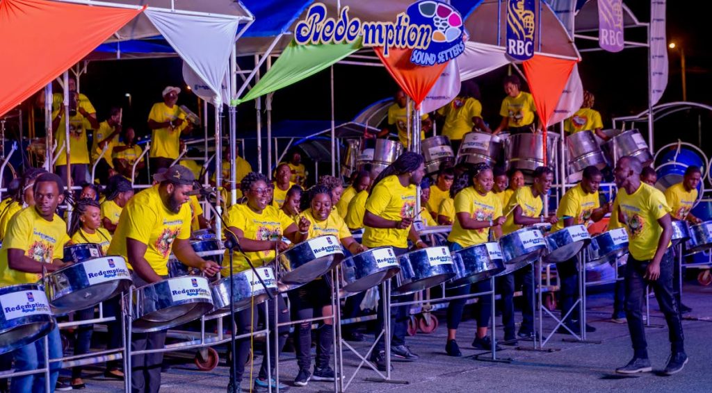 Members of RBC Redemption Sound Setters of Montgomery perform in the Large Conventional Bands category of the THA Pan Champs last Friday at the carpark of the Dwight Yorke Stadium, Bacolet.