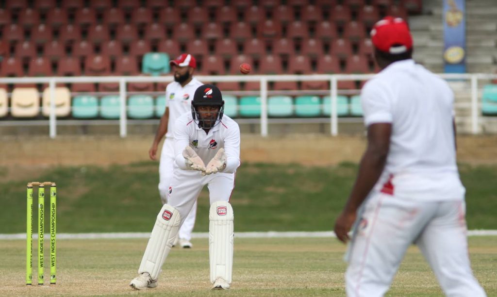 In this February 2 file photo, TT Red Force captain Denesh Ramdin catches the ball from a fielder during their encounter against the Guyana Jaguars at the Queen’s Park Oval, St Clair.