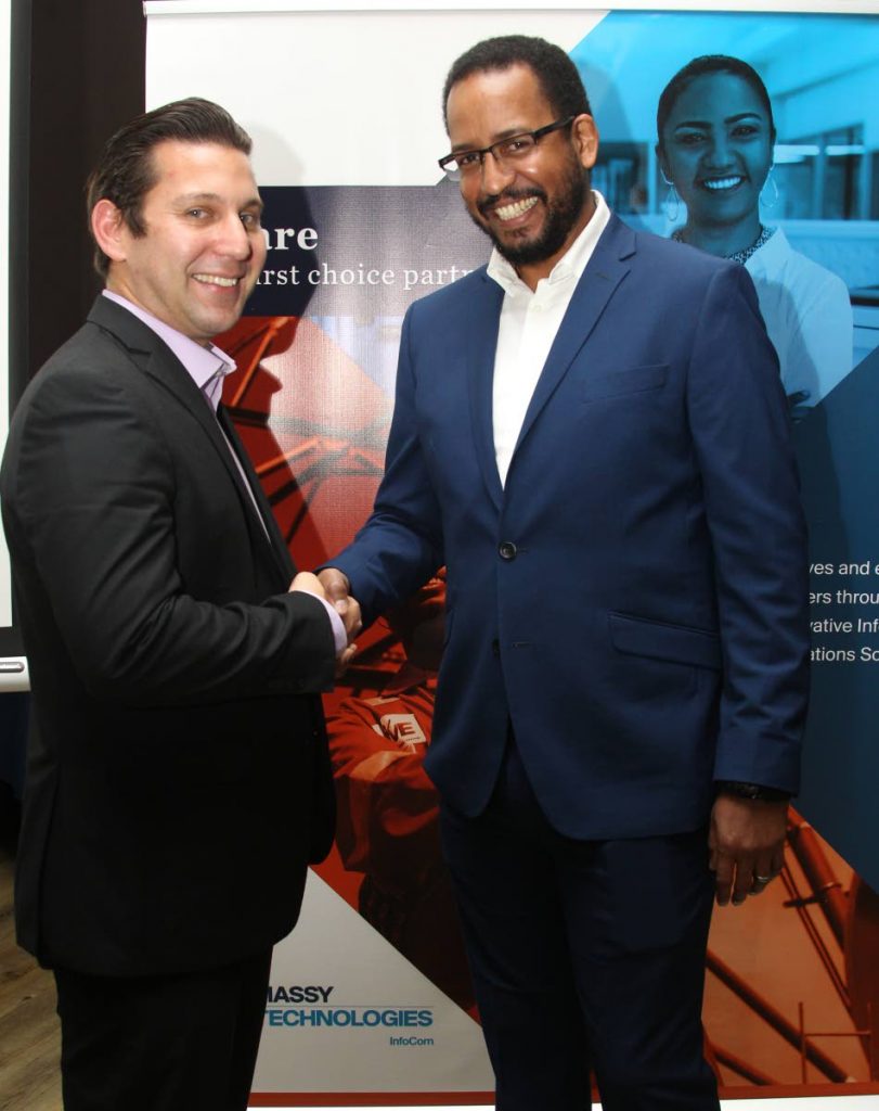 
Manuel Rodrigues, ITD sales director (Caribbean) at Schneider Electric and Ian John, CEO Massy Technologies InfoCom. 