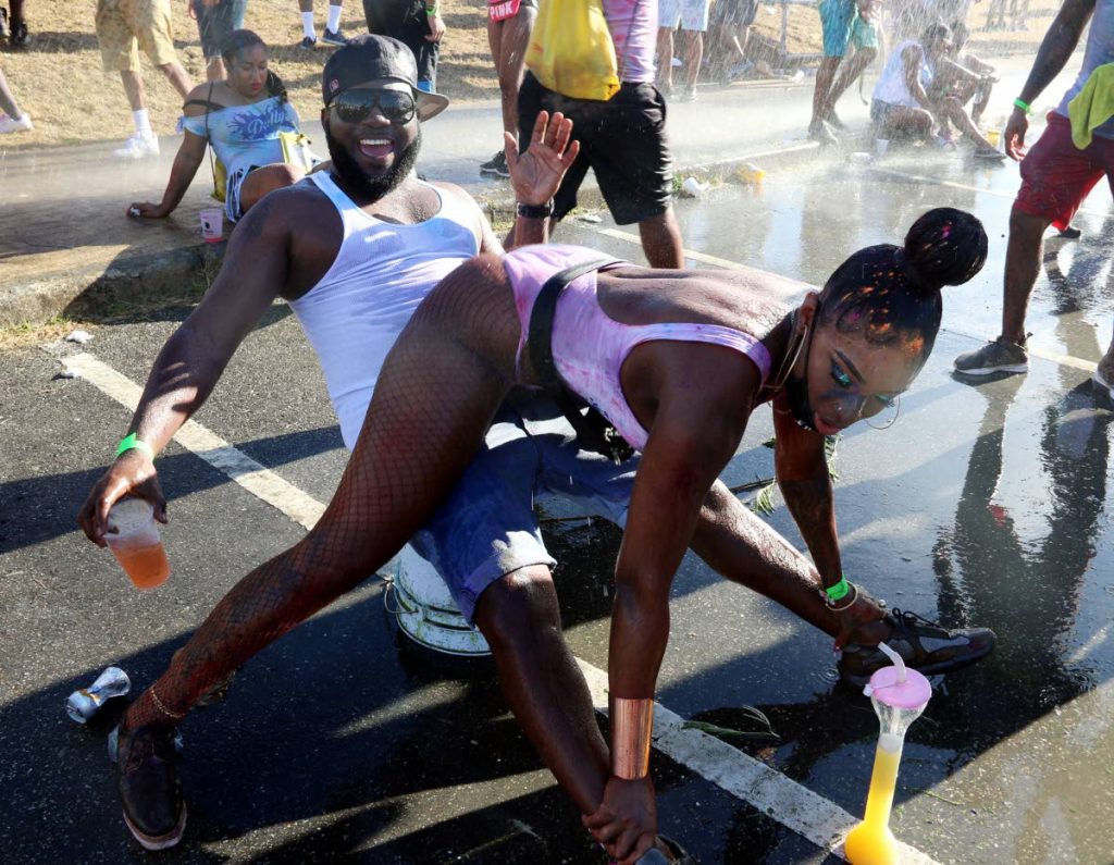 Revellers in Dutty Carnival J'Ouvert party at Brian Lara Cricket Academy, on February 23. PHOTO BY ANSEL JEBODH