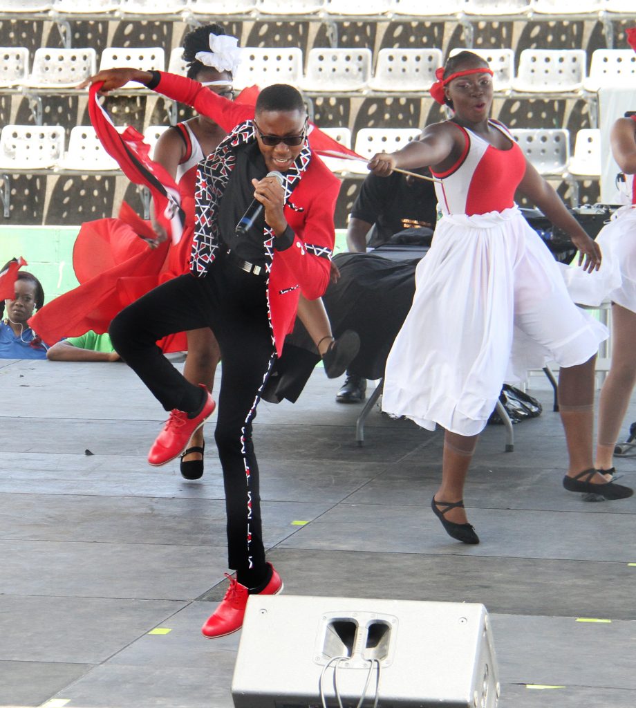 Stefan Camejo of St Francois Boys' College, Belmont, performs his winning song Raise Up at the National Schools' Soca Monarch held at the Jean Pierre Complex yesterday.
