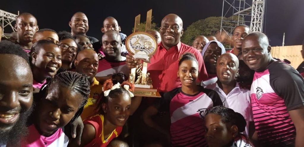 Sheldon Montique, TT Defence Force band manager, centre, celebrates with his members on the skinner park stage victory in the panorama finals small band category in the early hours of Friday morning. PHOTO BY YVONNE WEBB