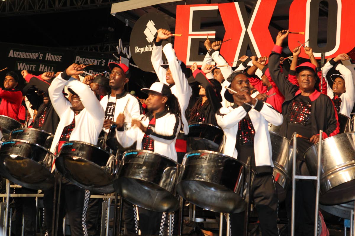 Members of Exodus Steel Orchestra enjoy themselves as they play Kees Diefenthaller's Savannah Grass in the large band Panorama finals in Queen's Park Savannah, Port of Spain on Carnival Saturday. PHOTO BY ROGER JACOB