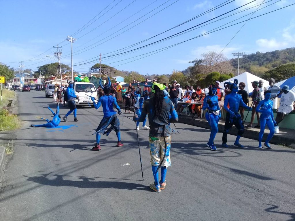 Pioneers of Calder Hall blue devils in J'Ouvert revellery on Carnival Tuesday. The group celebrates on Tuesday and not on Carnival Monday. FILE PHOTO