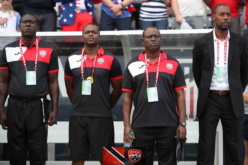 National goalkeeping coach Ross Russell, left, with the rest of the technical staff, (from left) assistant coach Stern John, assistant Stuart Charles-Fevrier and head coach Dennis Lawrence. PHOTO COURTESY TTFA 