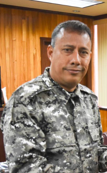 CAMOUFLAGE: Police 
Commissioner Gary Griffith in his camouflage uniform.