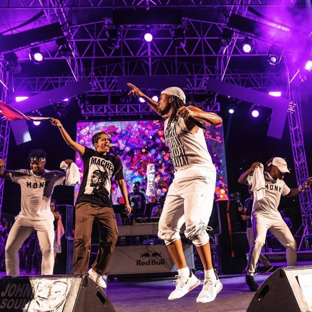 Lilly Singh, IISuperwomanII, second from left, on stage at a recent fete with soca star Machel Montano. Singh will be the only woman to host a late-night talk show on a major network. A Little Late with Lilly Singh launches in September on NBC.