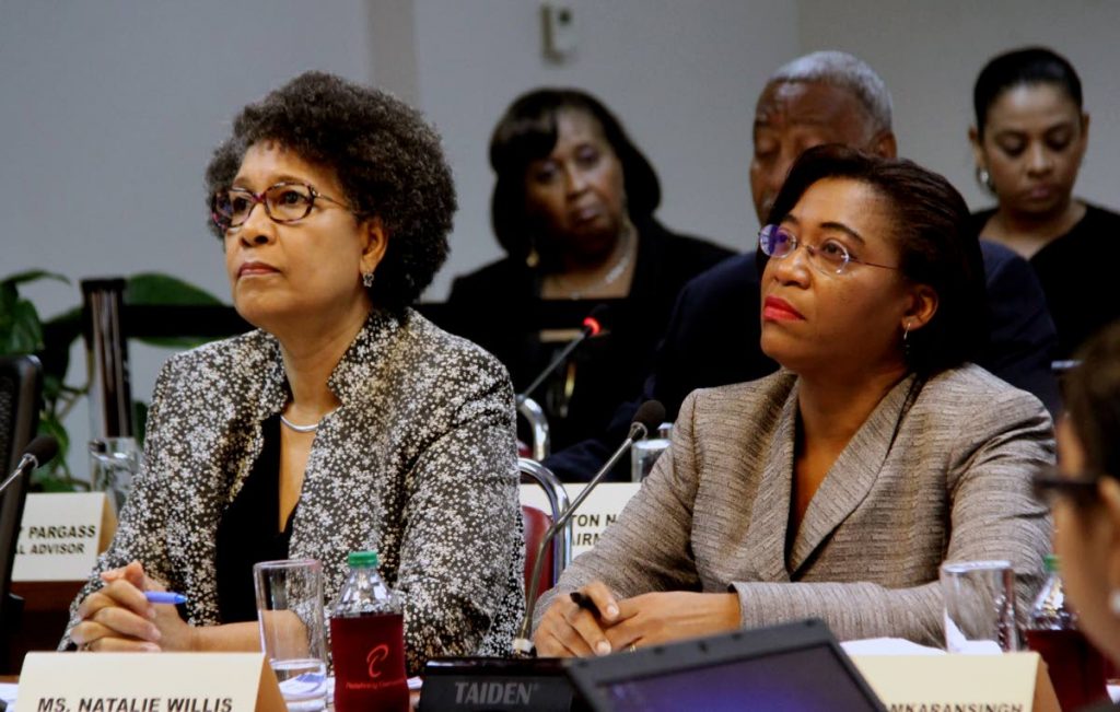 ECA interim CEO Stephanie Fingal, left, and acting Labour Ministry permanent secretary Natalie Willis during a public hearing of the Human Rights, Equality and Diversity Committee at Tower D, Port of Spain International Waterfront Centre last Friday.  PHOTO BY SUREASH CHOLAI