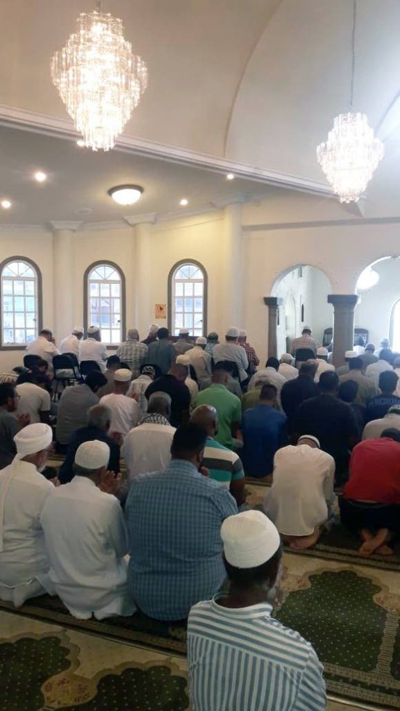 SPECIAL PRAYERS: Muslims offer special prayers yesterday at San Fernando ASJA mosque, for victims of the New Zealand massacre. PHOTO BY AZARD ALI