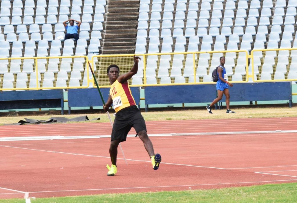Veayon Joseph, of Pentecostal Light and Life Foundation,throws the javelin to place first in the Boys Under-17 javelin, at the National Secondary School Track and Feild Championships, at the Hasely Crawford Stadium, Port of Spain.