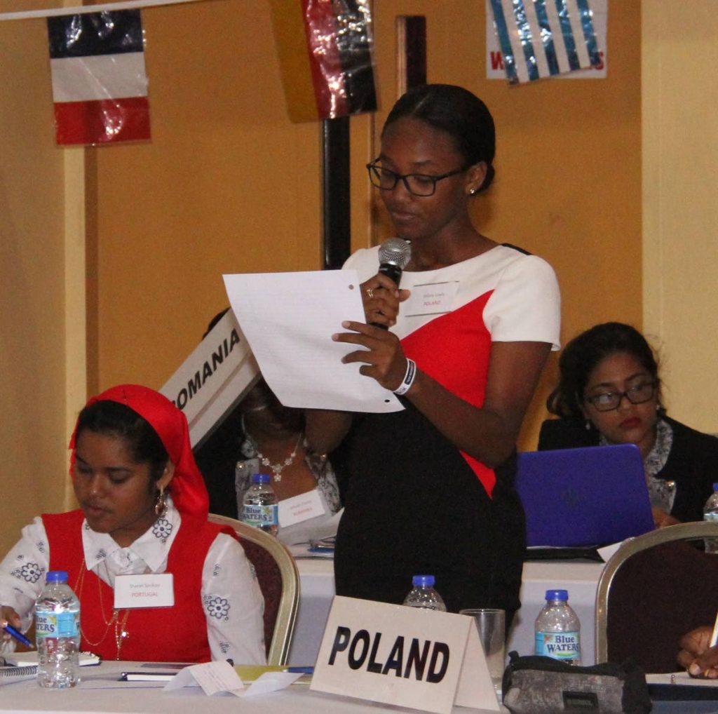 A delegate makes her point at the  Rotary Club of Central Port of Spain Model UN (MUN) 2019 Resolution on International Migration and Development debate at Cascadia Hotel, St Ann’s yesterday. PHOTO BY AYANNA KINSALE