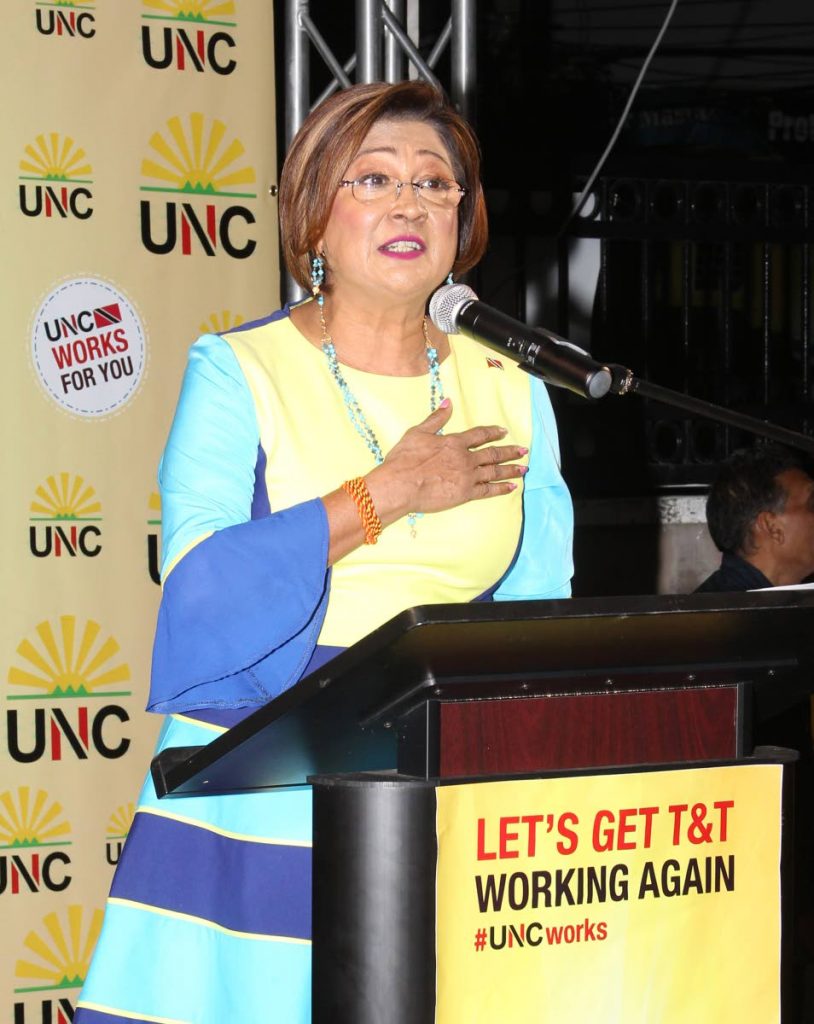 Opposition Leader Kamla Persad-Bissessar vows to capture the Tunapuna seat in general elections at the opening of the UNC Regional Office, Eastern Main Road, Tunapuna yesterday. PHOTO BY ROGER JACOB