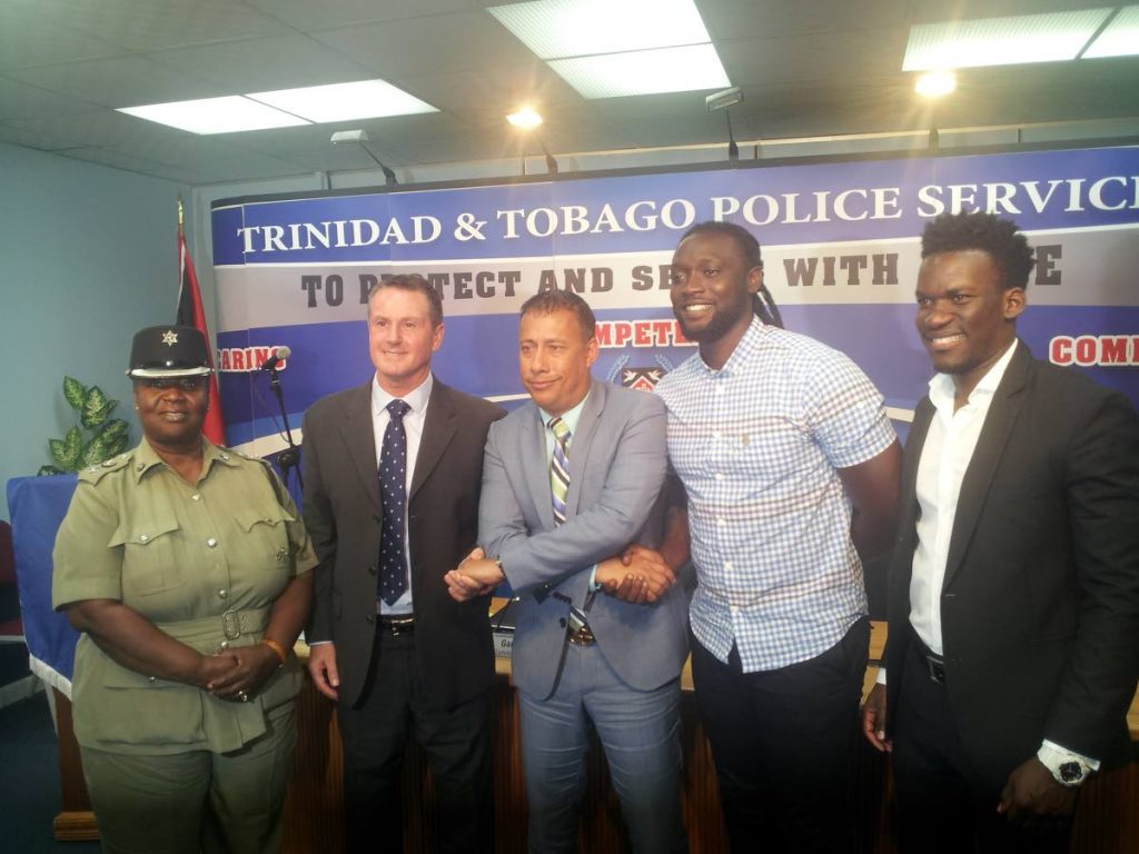 Police Commissioner Gary Griffith, centre, at the launch of the Commissioner’s Cup, yesterday. Also in the photo are assistant Commissioner of Police, community relations, Patsy Joseph, from left, technical director of Football Factory Terry Fenwick, former TT footballer Kenwyne Jones and TT Football Association general secretary Camara David.
