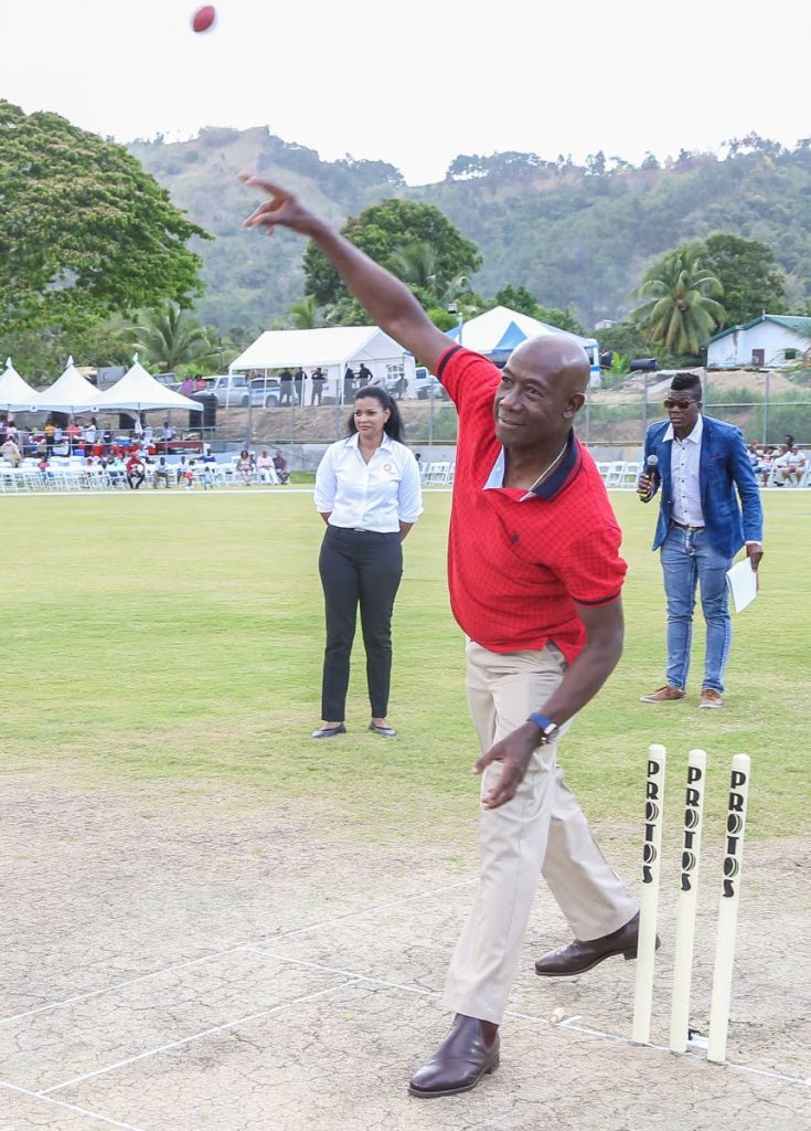 FULL TOSS: In this file photo Prime Minister Dr Keith Rowley sends down a full toss as he bowled the first ball at the opening of the Diego Martin sporting complex in 2019. Photo by Jeff Mayers