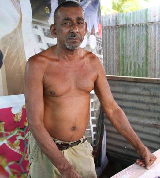 WHY DO MY SON THIS?: Kazim Hosein, father of Shazam Hosein who was one of three men kidnapped, was yesterday asking why someone would want to harm his son. PHOTO BY VASHTI SINGH 
