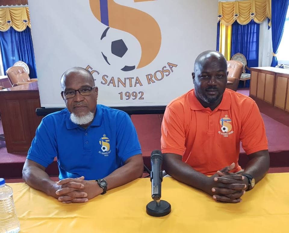 New FC Santa Rosa coach Shurland David (right) with club owner Keith Look Loy, at yesterday's media conference. 