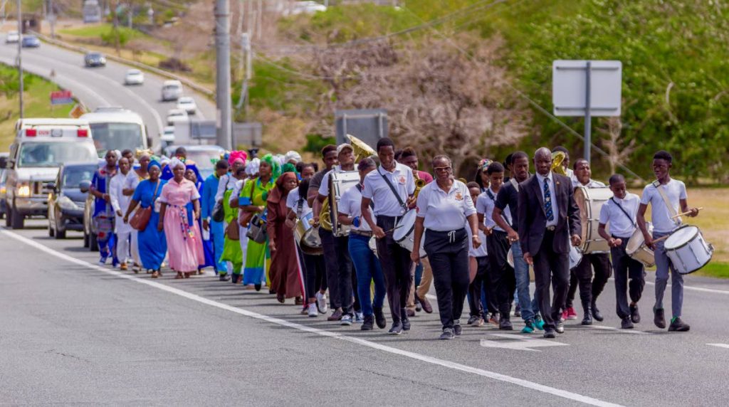 In this 2019 file photo Spiritual Baptists walk in procession from Spring Garden to Signal Hill as part of Liberation Day celebrations hosted by the Tobago United Spiritual Baptist Assembly.