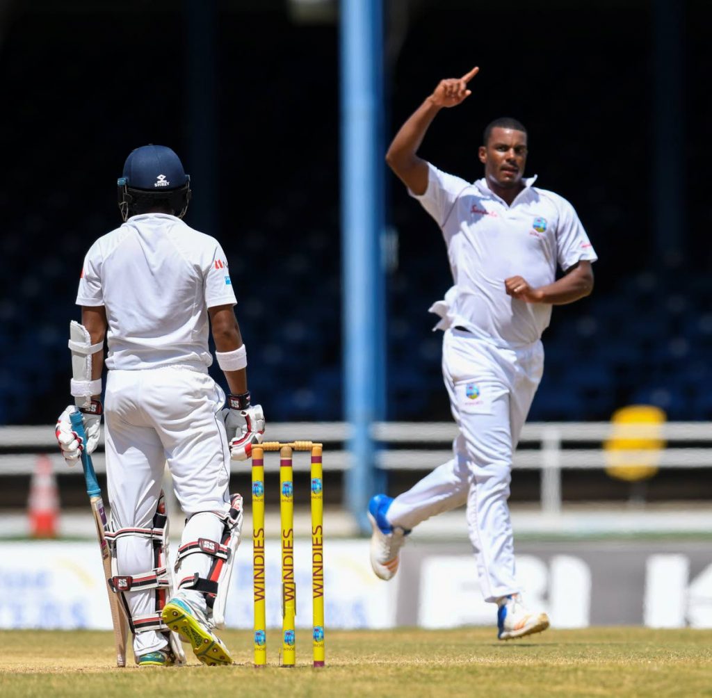 Shannon Gabriel of West Indies, right, celebrates the dismissal of Kusal Mendis of Sri Lanka at Queen’s Park Oval, Port of Spain.