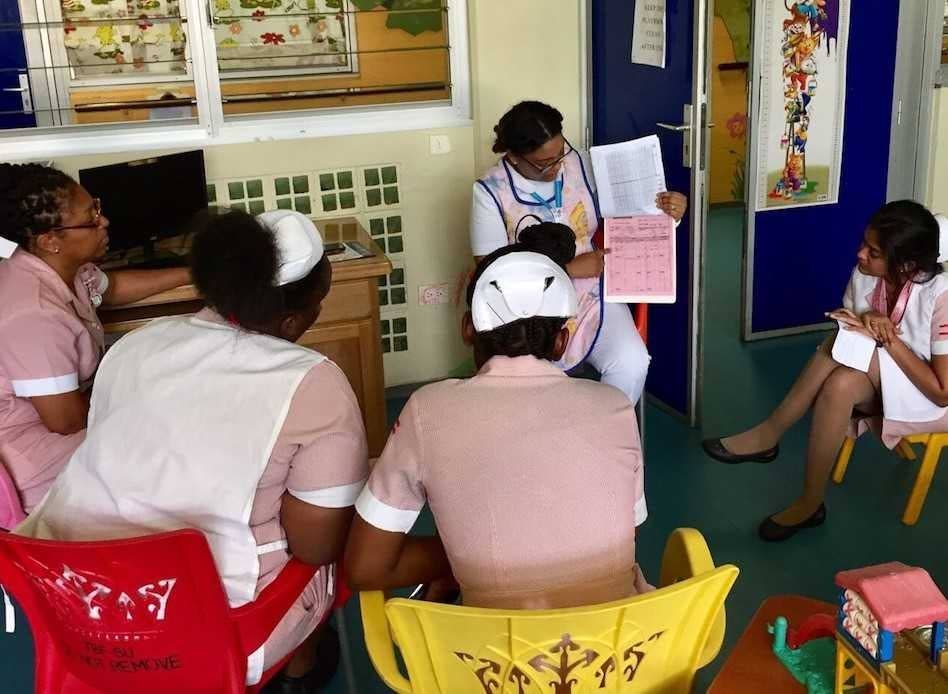  A nursing student facilitates a training session as part of leadership development.
