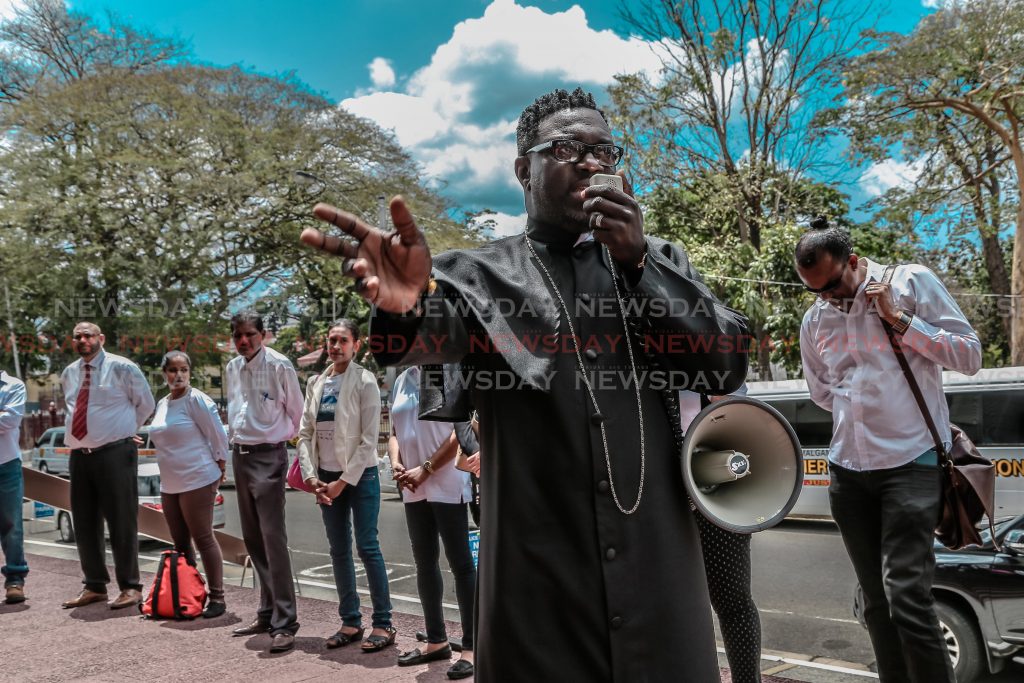File photo: Bishop Duke. PSA President Watson Duke addressing members of Hall of Justice as well as BIR workers. Outside Hall of Justice, Port of Spain in April.

Photo:  Jeff K. Mayers