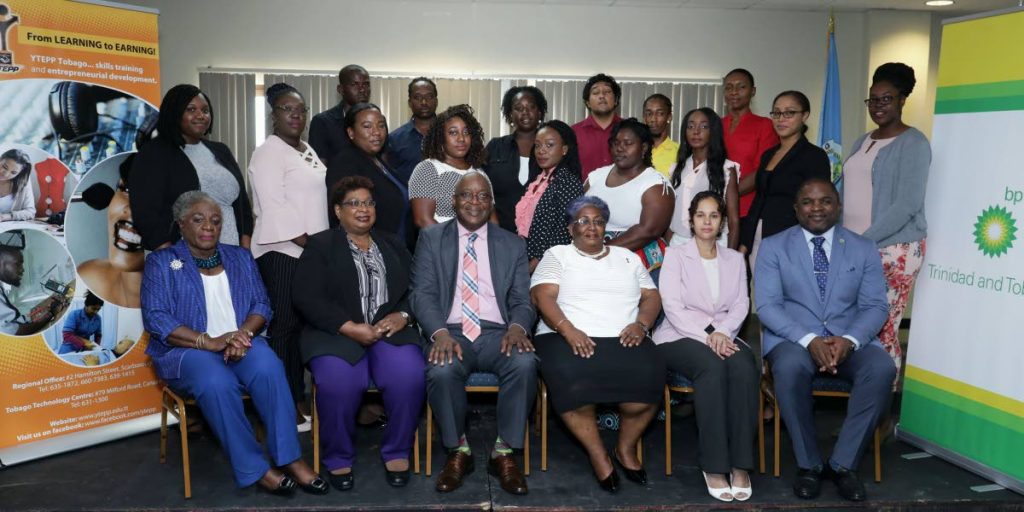 Chief Secretary Kelvin Charles, seated centre, alongside (from left) YTEPP board member Cecile Beckles, acting YTEPP CEO Donna Scoon-Moses, chairman of the board Thora Best, bpTT corporate responsibility officer Jolie Francis and Assemblyman Joel Jack, and participants of the Entrepreneurial Development Training programme at its launch Monday. 