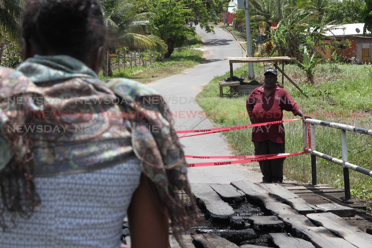 Bridge burnt at Gobin Village - Trinidad and Tobago Newsday