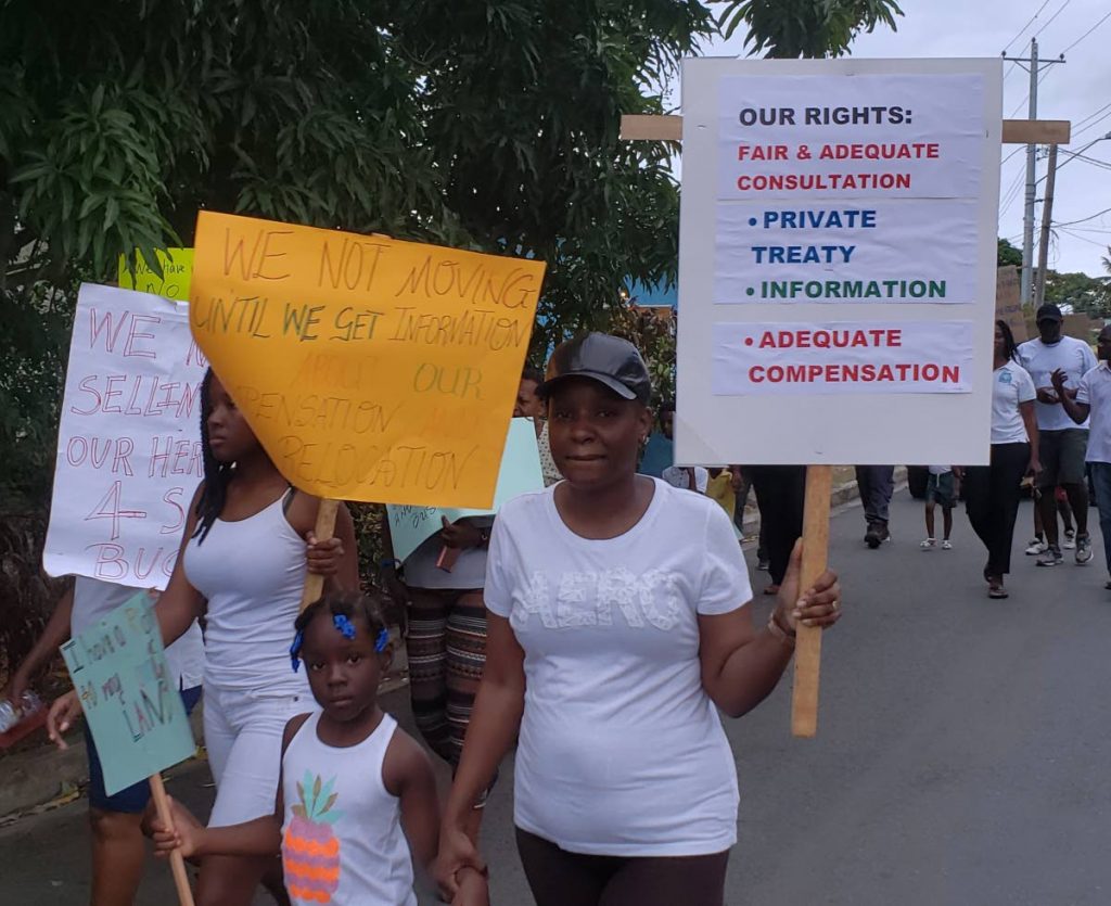 Crown Point and Bon Accord residents protest for more information on the ANR Robinson International Airport expansion project on March 28. Residents again protested today at the Division of Tourism, Transportation and Culture. FILE PHOTO