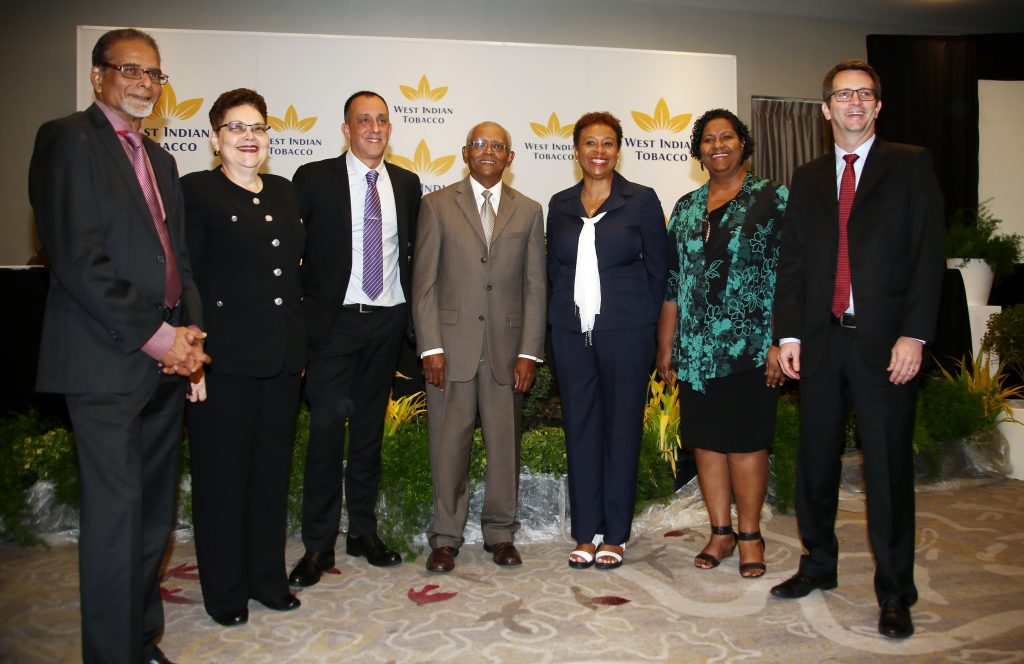 Jean-Pierre du Coudray 3rd from left ,Witco's Managing Director with his board of directors from left Ranjit Jeewan, Danielle Chow, Anthony Phillip, Ingrid Lashley, Isha Reuben Theodore and Claudio Wulf  at WITCO's 114th annual meeting of shareholders at the Hyatt Regency in  Port of Spain.PHOTO SUREASH CHOLAI