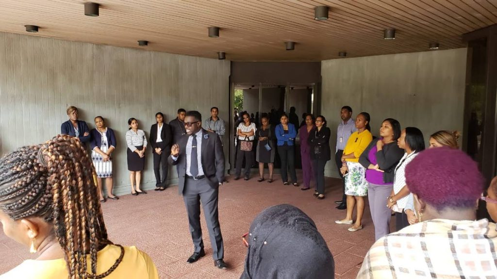 PSA president Watson Duke addressing Judiciary workers in front Hall of Justice, Port of Spain after teh workers hourly prayer session. 