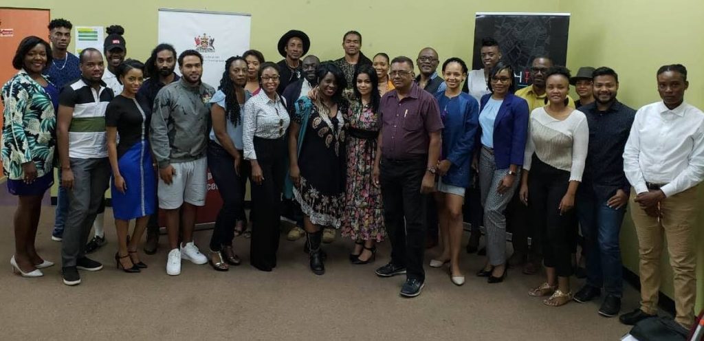  NEDCO’s regional development manager, Fazad Mohammed, front row, sixth from right and senior business incubation officer, Colin Providence, back row, second from right, with FashionTT’s general manager Lisa-Marie Daniel, front row, seventh from right, and the fashion designers at the orientation session of the business advisory and financing tier.