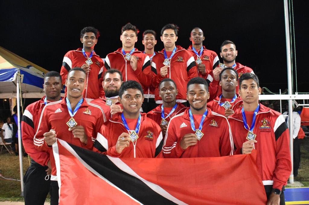 TT's 19 and under water polo team display their gold medals after winning their category this past weekend, at the Carifta 2019 Water Polo Championships, in Barbados.