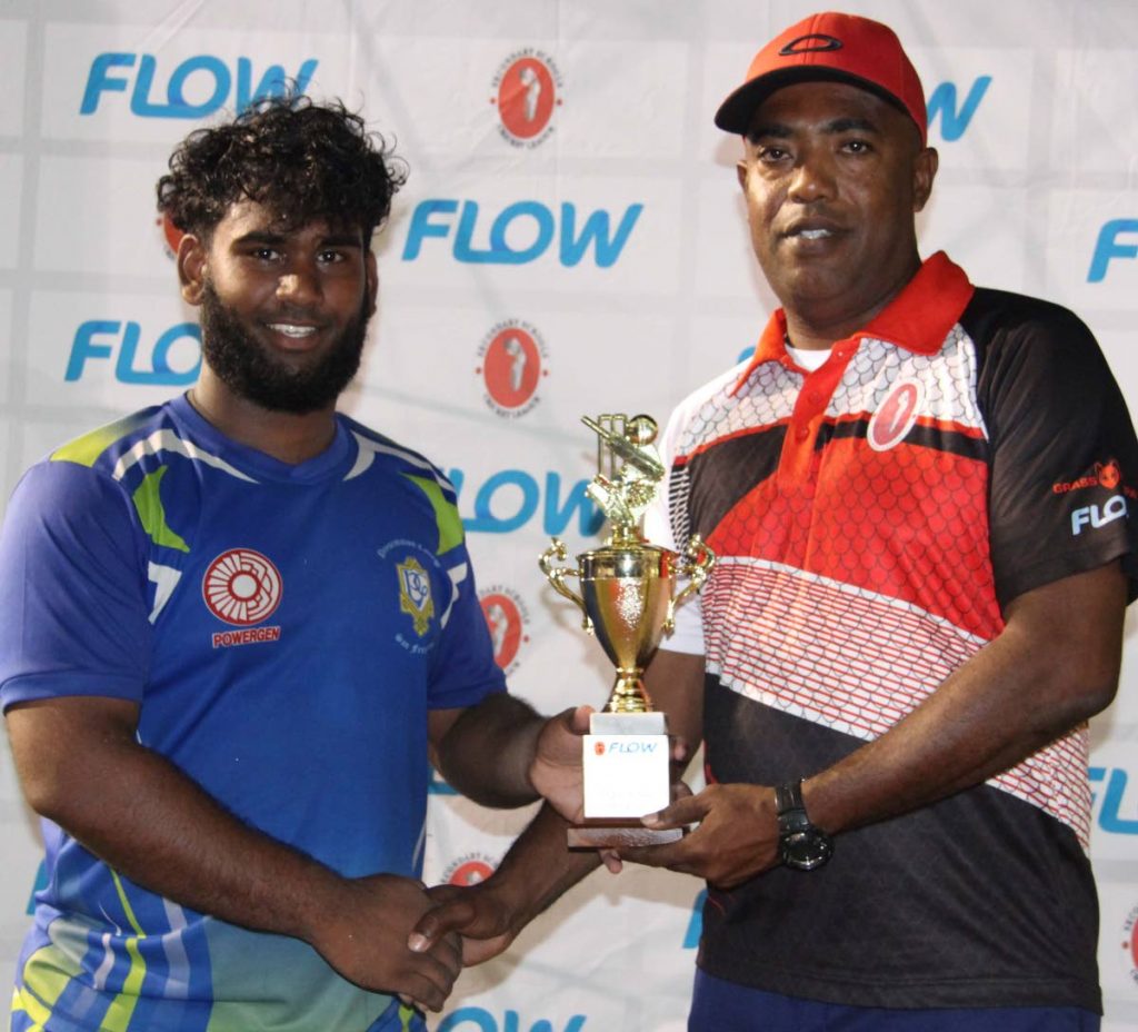 Presentation College's Sanjay Jawahir, left, collects a prize for Best Bowler from Secondary Schools Cricket League PRO Anib Forgenie. PHOTO BY VASHTI SINGH 