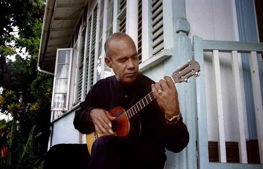  Robert Munro photographed in 1999 outside his house on the corner of Duke and Melbourne Streets in Port of Spain.

Photo: Mark Lyndersay
