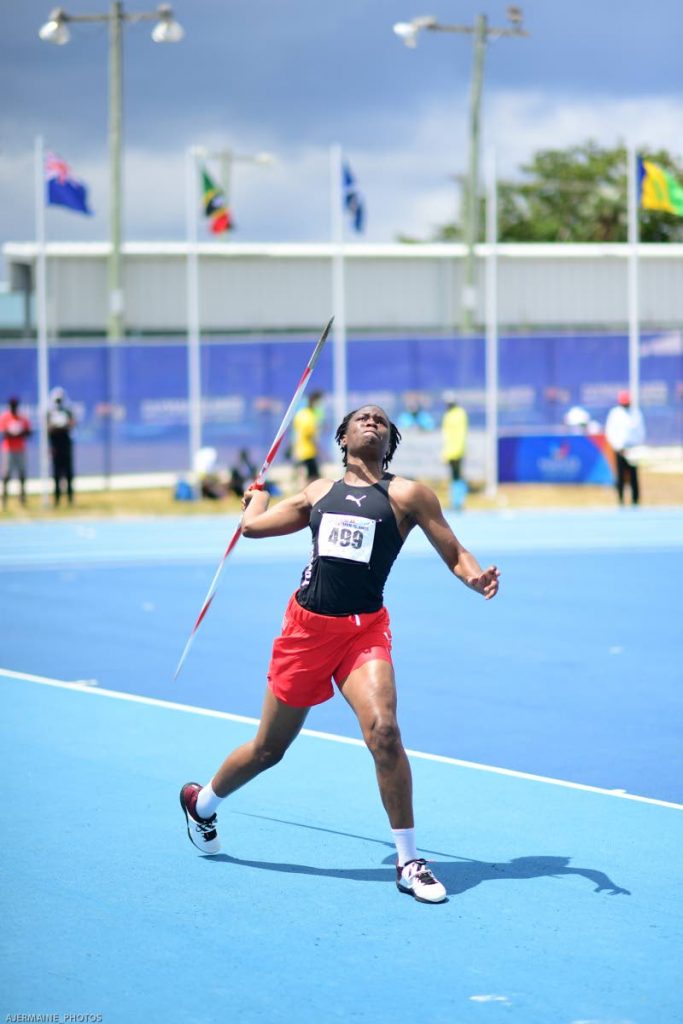 TT's Safiya John competes in the javelin event of the girls open heptathlon at Carifta Games in the Cayman Islands yesterday. PHOTO BY Dennis Allen for @TTGameplan
