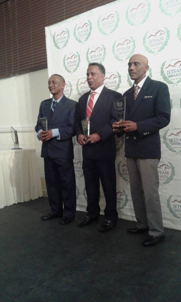 Rajpaul Rajkumar (left), Brian Harding (centre) and Ricardo Jadoo with their plaques after their induction into the Horse Racing Hall of Fame, at the annual Jetsam Awards ceremony, at the Century Ballroom, Queen’s Park Oval on Friday. 