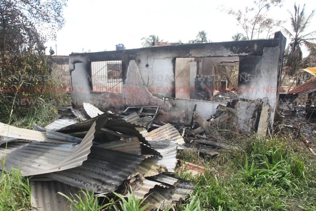 The burnt out home of  65-year-old Michael Chadee of Allahar Street, La Romaine where his remains were found following a bush fire which caused the house fire. Photo by Lincoln Holder
