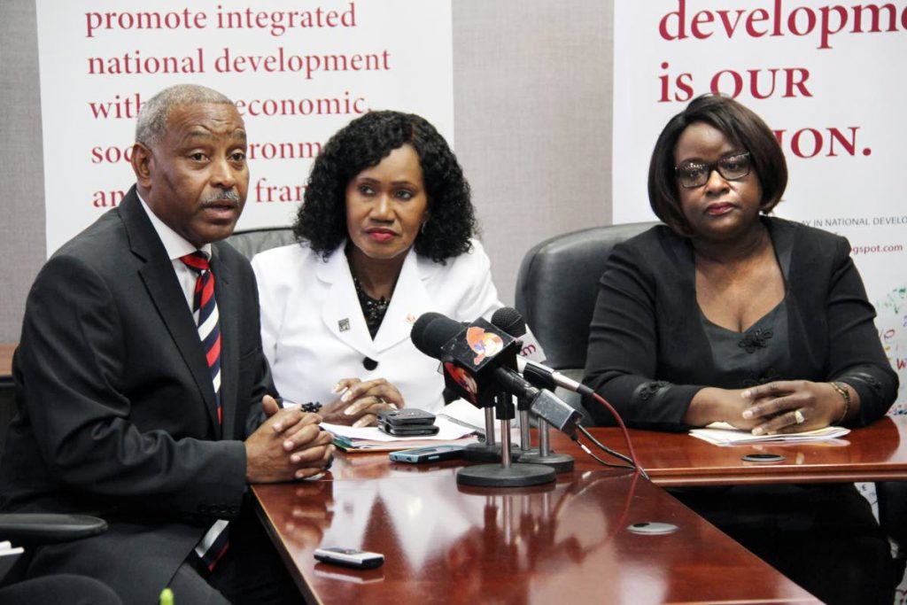 In this 2017 file photo, Keston Nancoo, chairman of the Employers’ Consultative Association, responds to a question at a news conference following the meeting of the National Tripartite Advisory Council (NTAC) at the Eric Williams Financial Complex, Port of Spain. Looking are Labour Minister Jennifer Baptiste-Primus and NTAC Chairman, 
Camille Robinson-Regis. 