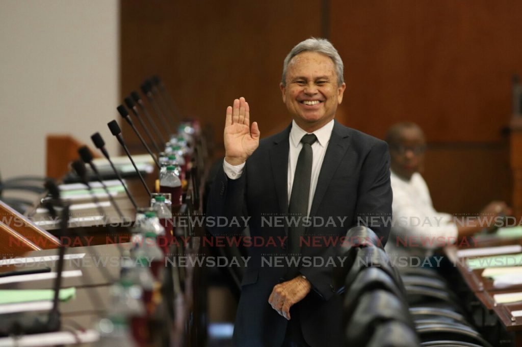 File photo of Finance Minister Colm Imbert smiling in parliament.

Photo: Jeff K Mayers
